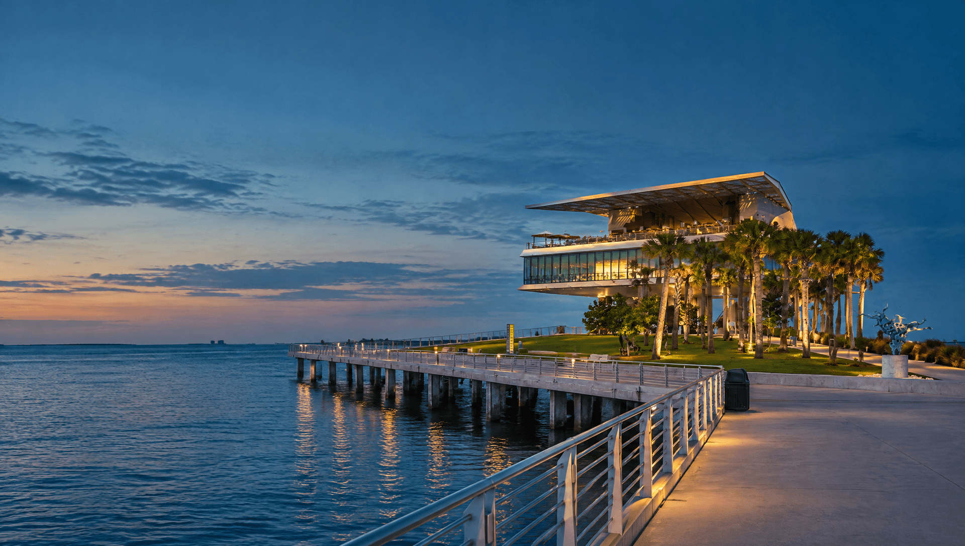 Photo illustration of the modern St. Pete Pier beside Tampa Bay.