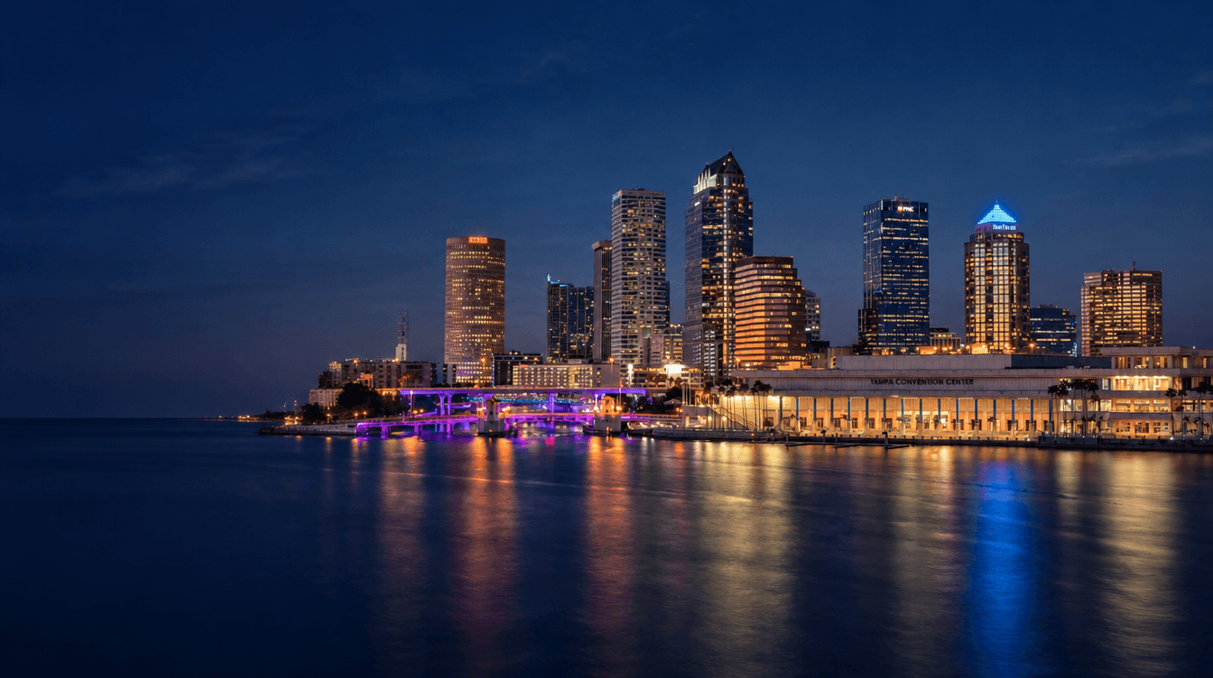 Photo illustration of downtown Tampa and the Convention Center reflected across the waterfront at dusk.